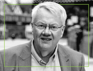 Black and white headshot of Colin Craney a tribute to an excellent lift consultant, columnist, expert witness, colleague and friend